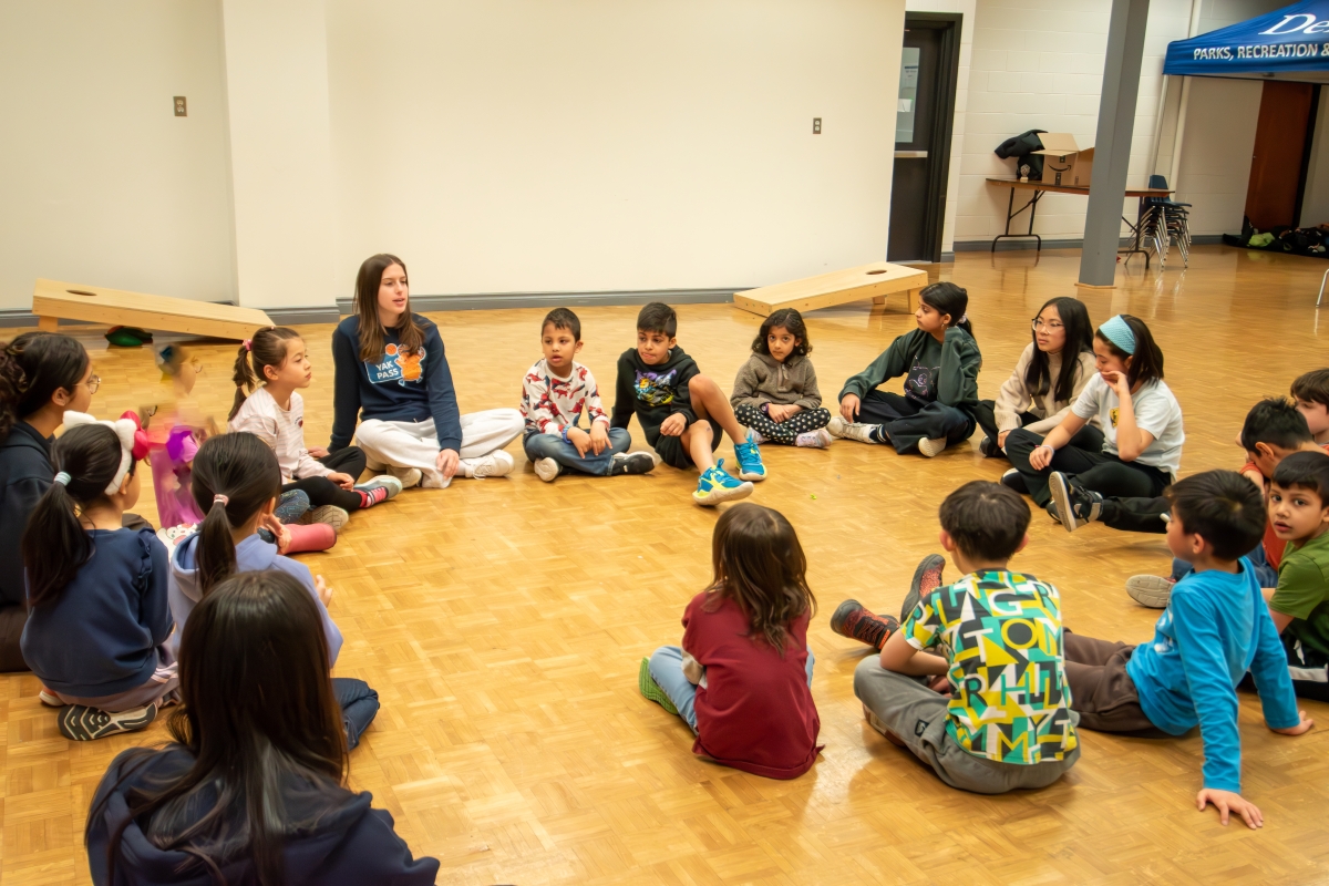 A group of children hang out at a community recreation class. 