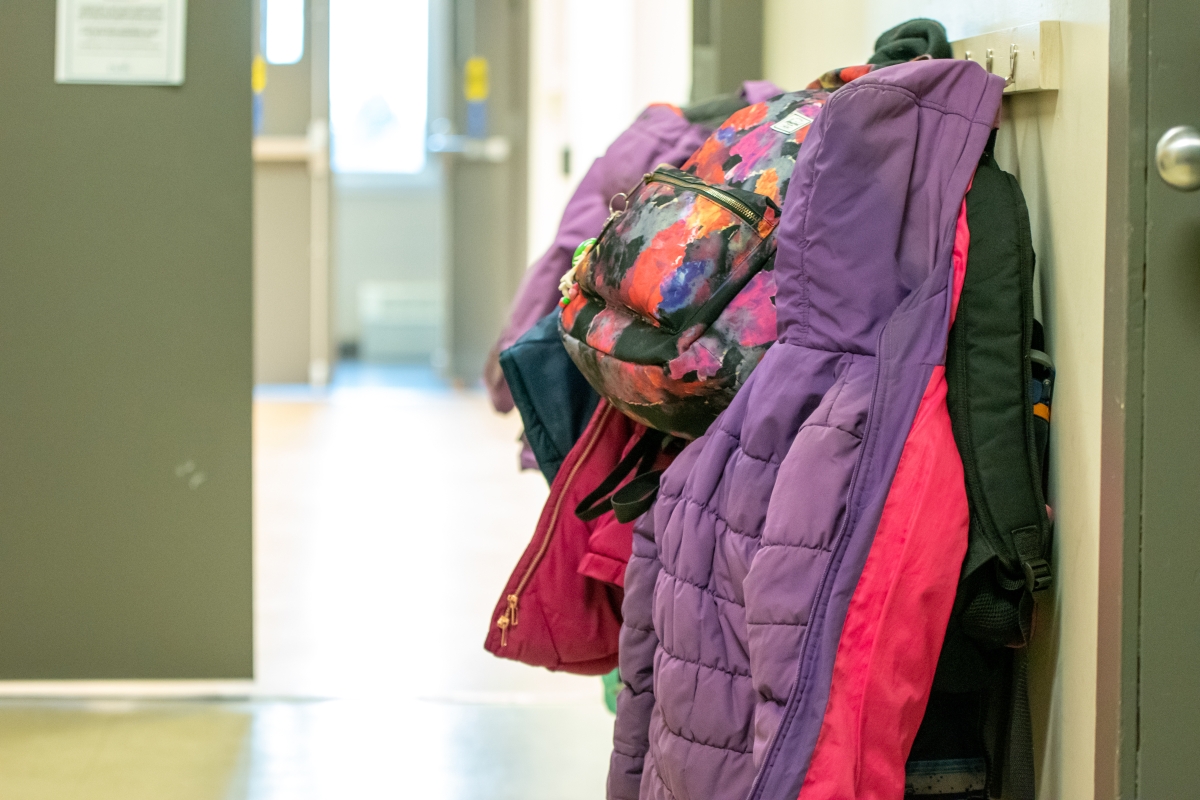At day camps, coats are hung on the rack. 