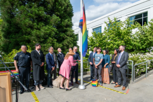 City officials raising pride flag